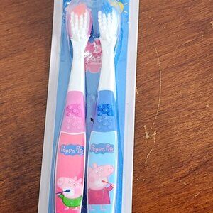 Entertainment One Pink and Blue 2pk Peppa Pig Brush Buddies Soft Toothbrushes